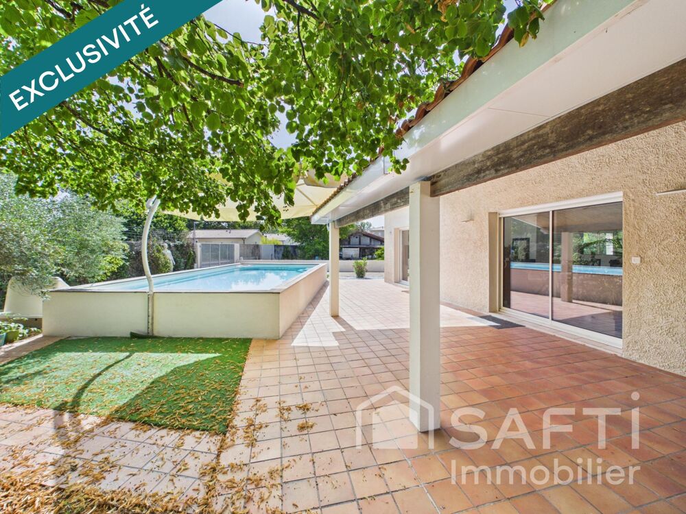 Vente Maison Maison de plain pied de 155 m2, 4 chambres, avec piscine, grand terrain et environnement calme Le taillan-médoc