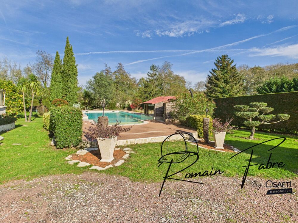 Maison de plain-pied 4 chambres, piscine, garage et belle parcelle de terrain au calme