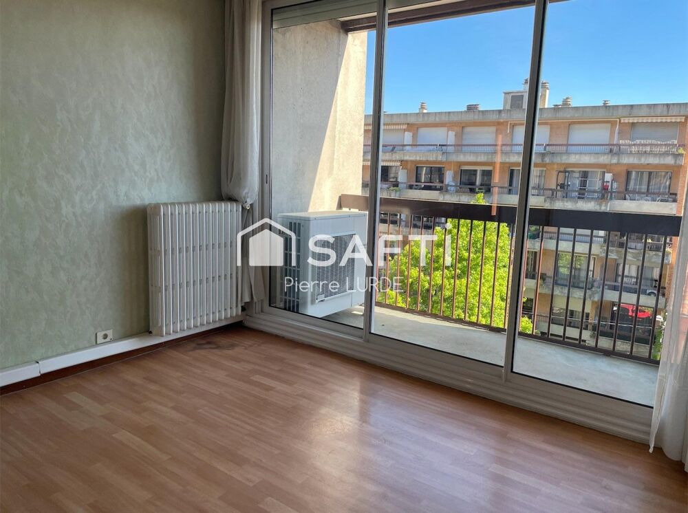 Appartement T5 rénové avec balcons et stationnement