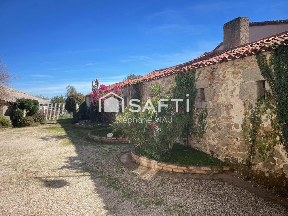 Très bel ensemble avec cette maison de plus de 180M2
