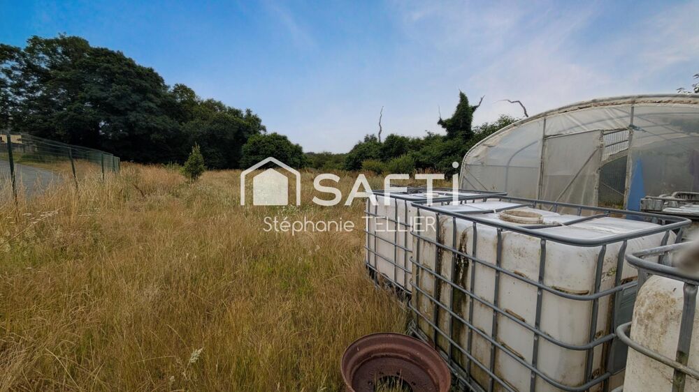 Vente Terrain Sur le Secteur de Callac Terrain avec une partie constructible + hangar Callac