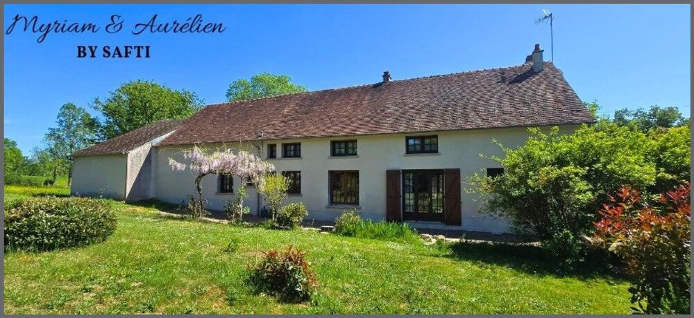 Maison 9 pièces garage sur terrain de plus de 3 hectares