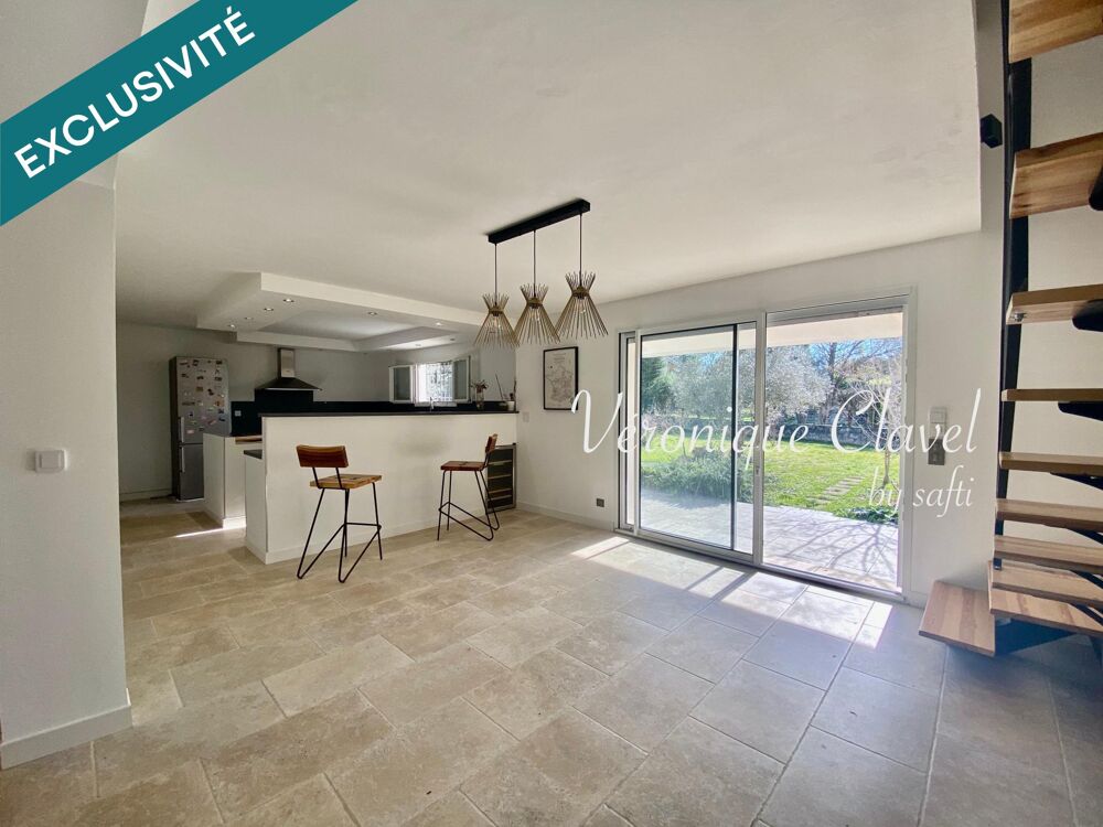 Propriété de 220m2 posée sur un terrain arboré de 1256m2 au calme