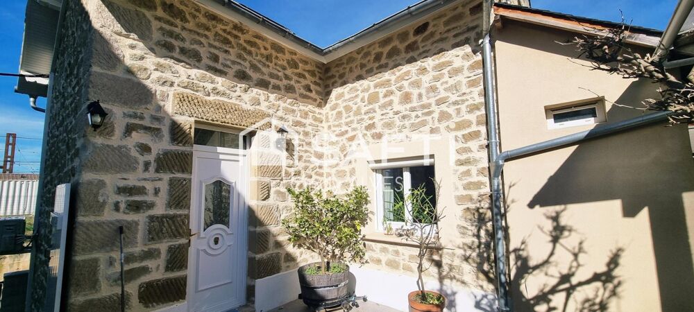 Maison en pierre avec jardin 2 terrasses et garage
