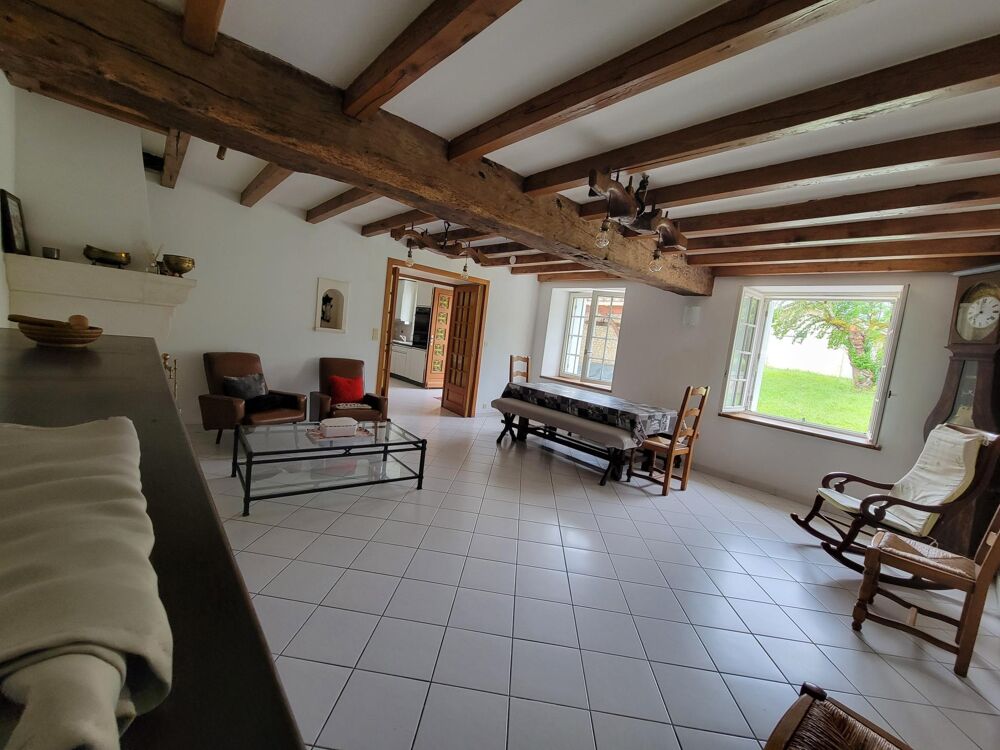 Maison avec deux logements garages jardin