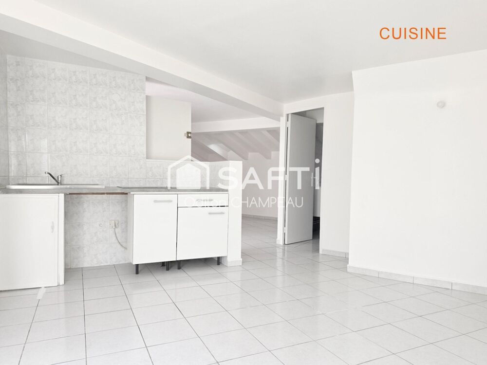 Appartement F2 de 47m2 avec terrasse - Emplacement stratégique