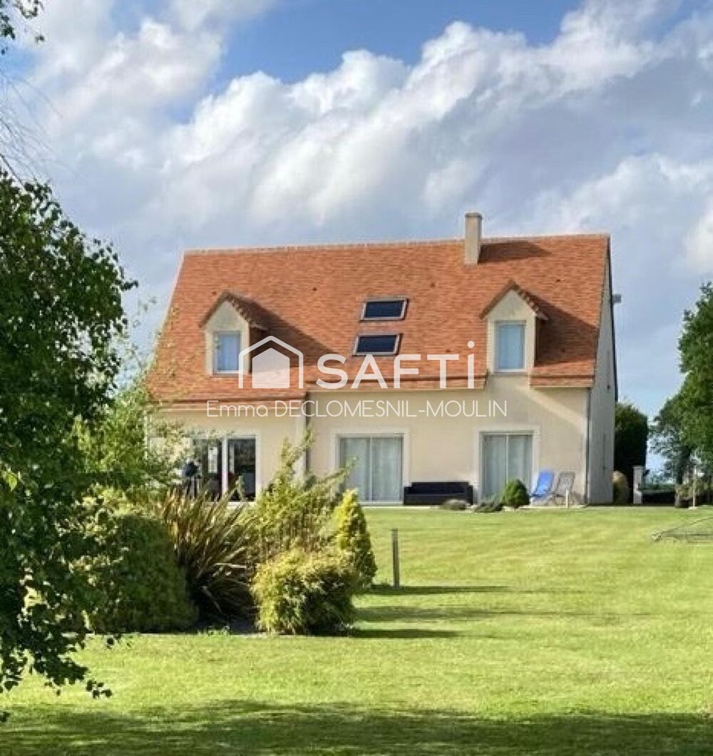 Superbe propriété, triple garage