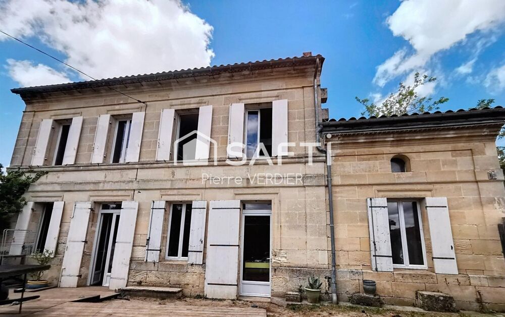 Maison en pierres, fond d'impasse, grand séjour