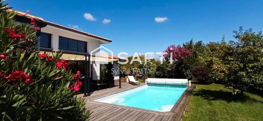 Maison contemporaine - 4 chambres - 3 salle d'eau - garage/atelier - piscine