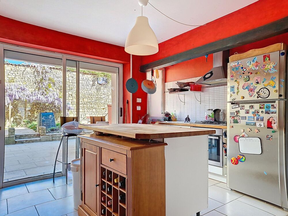 Maison de ville avec extérieur au coeur de Ville.