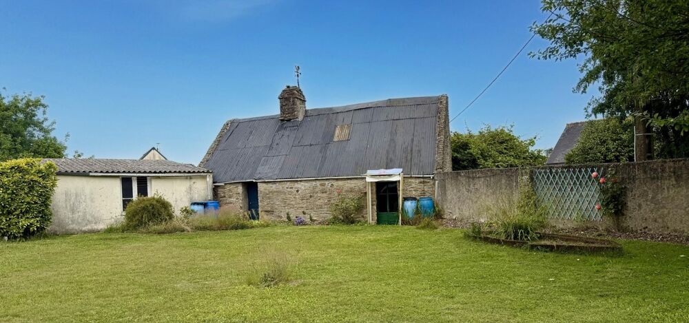 Maison d'habitation avec dépendance en pierre, atelier, sur 1 015 m² de terrain situé en zone constructible.