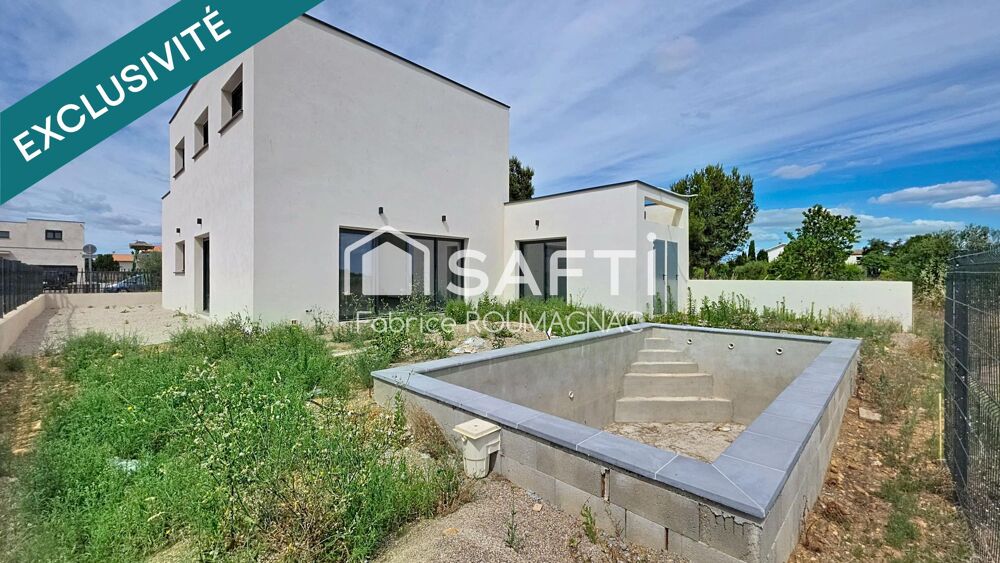 A Vendres villa de 148 m² quatre chambres, garage, piscine sur une parcelle de 627 m²