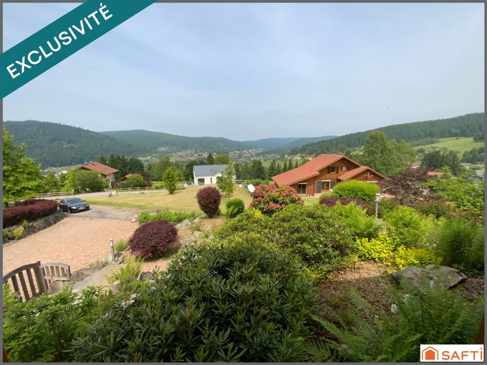 Chalet d'exception avec grand terrain paysagé de 2000 M2 , proximité des pistes et de la nature, emplacement rare.