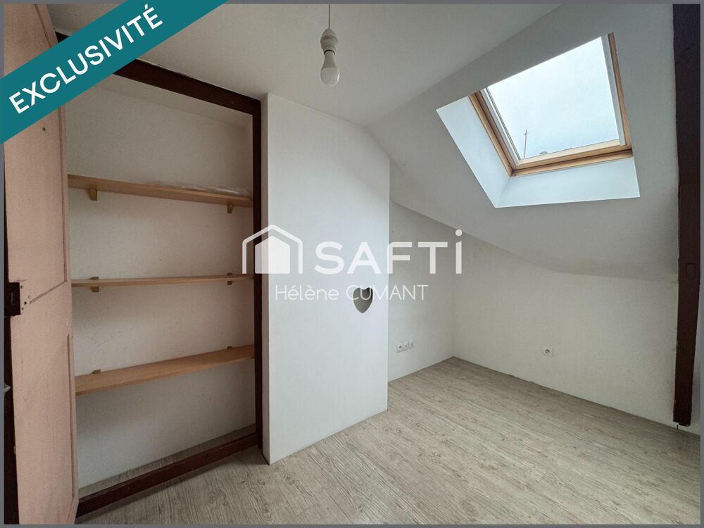 Duplex avec grand garage en plein coeur de Lisieux, au calme absolu à deux pas des commerces.