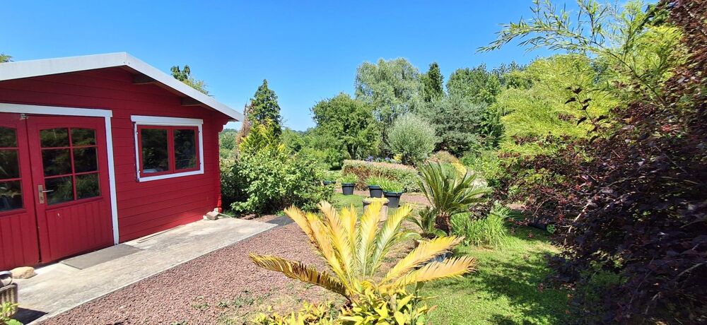 Charmante maison avec joli jardin arboré et marre
