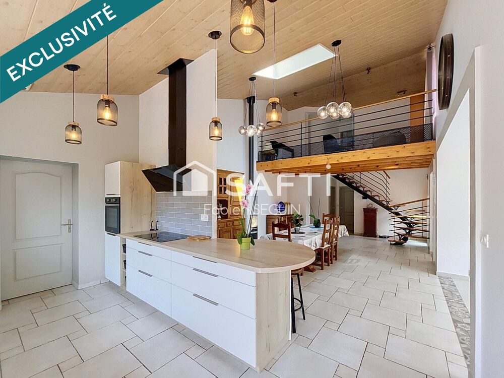Longère rénovée lumineuse, entretenue bénéficiant de beaux volumes !