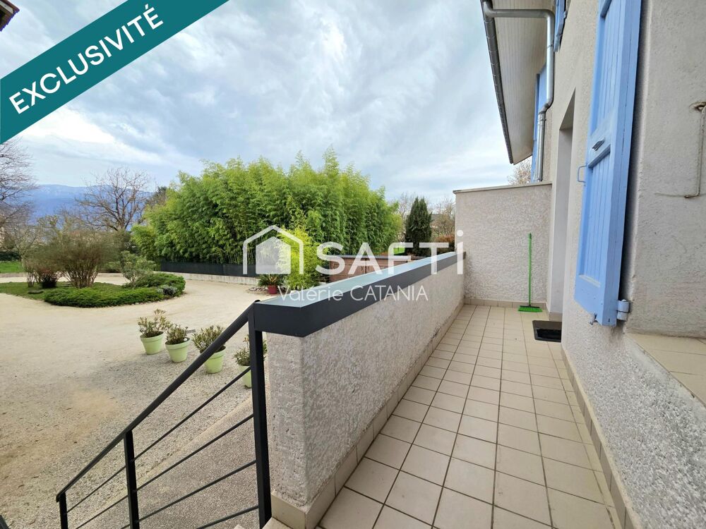 Tullins - Maison mitoyenne de 120m² habitables avec grand garage, cour.