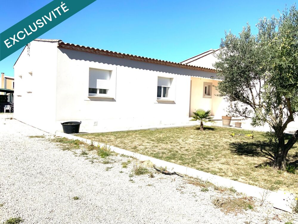 Maison T4 de 130m2 sur parcelle de 1124m2 en zone artisanale avec Hangar attenant .