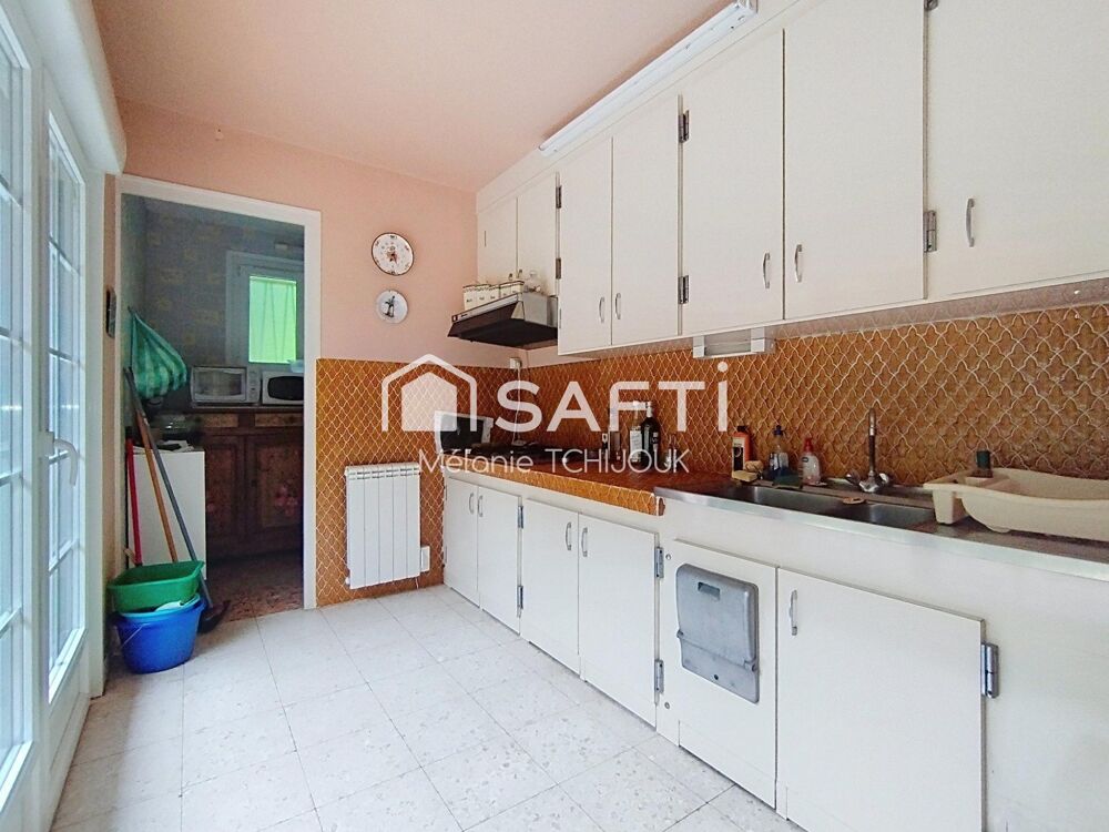 Maison avec studio indépendant sur terrain boisé