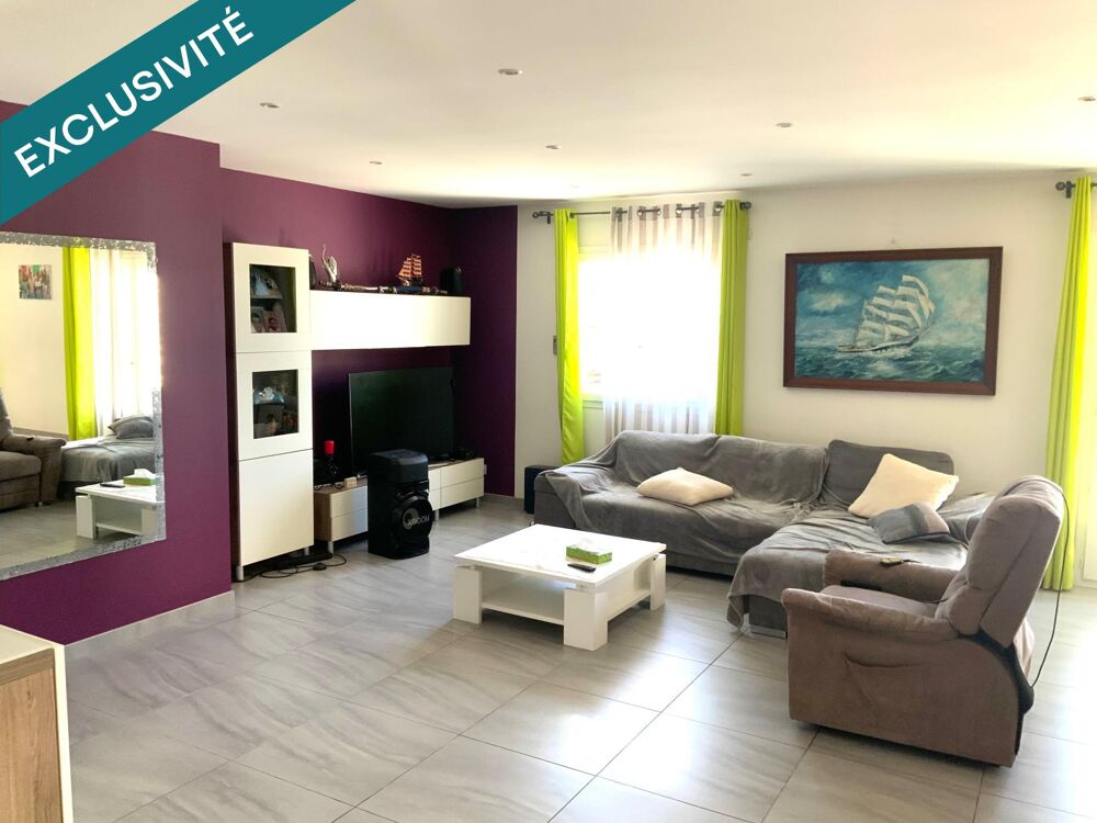 Maison T4 de 130m2 sur parcelle de 1124m2 en zone artisanale avec Hangar attenant .