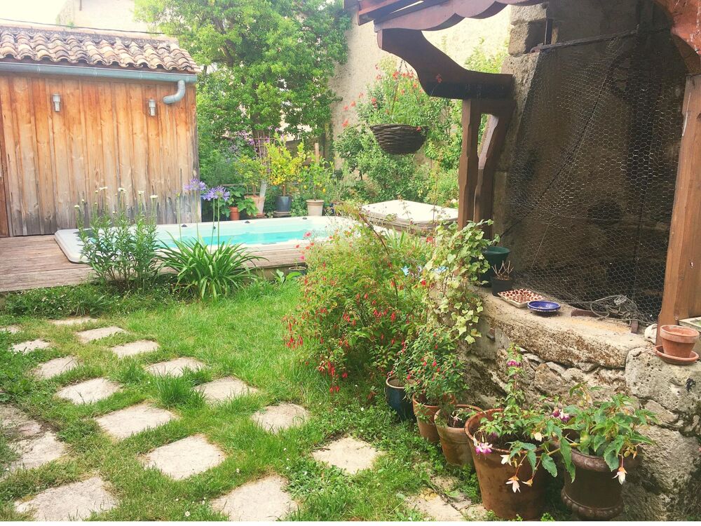 Maison de ville avec piscine balnéo