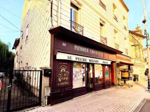   Coeur de VITTEL, bel immeuble mixte incluant un commerce pâtissier, chocolatier et 2 appartements loués 