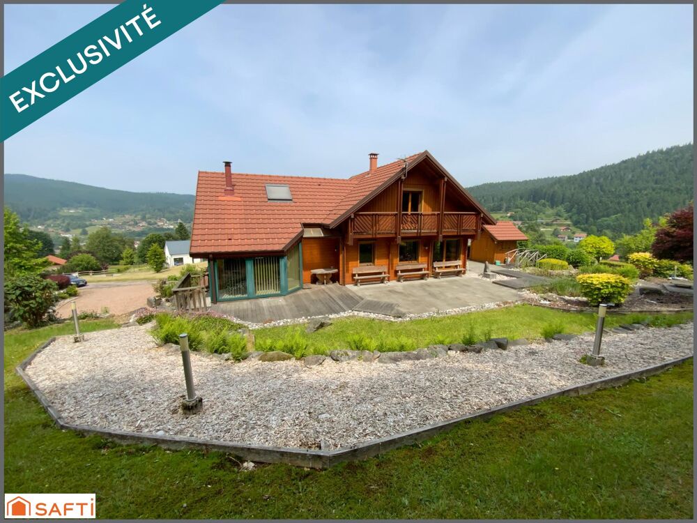 Chalet d'exception avec grand terrain paysagé de 2000 M2 , proximité des pistes et de la nature, emplacement rare.