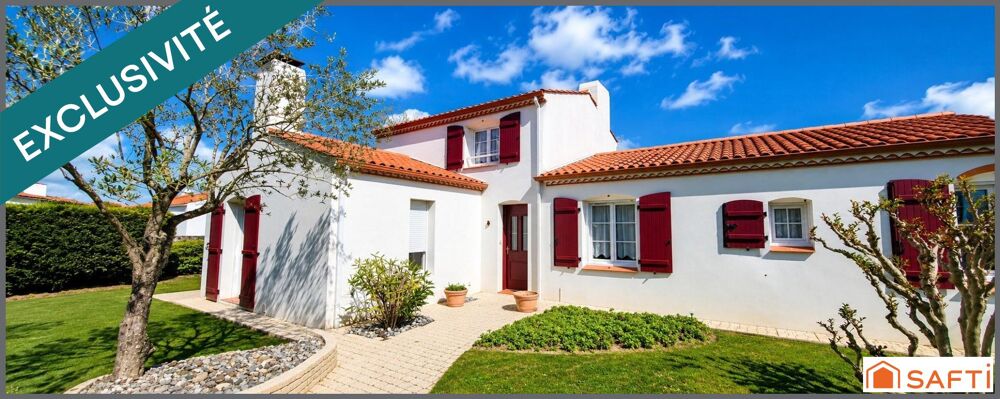 Maison familiale avec vie de plain-pied, double garage et jardin paysagé