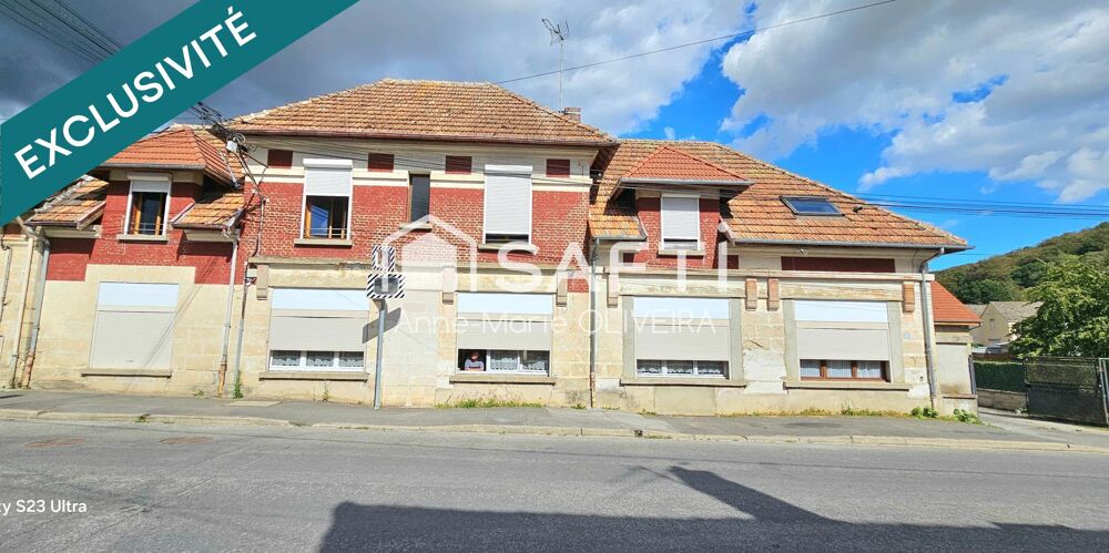 Vente Immeuble Immeuble 430 m2 comprenant : 7 lots ( 6 apparts + un atelier de 150m2 ) une cour, offrant un bon investissement en gestion libre Chauny