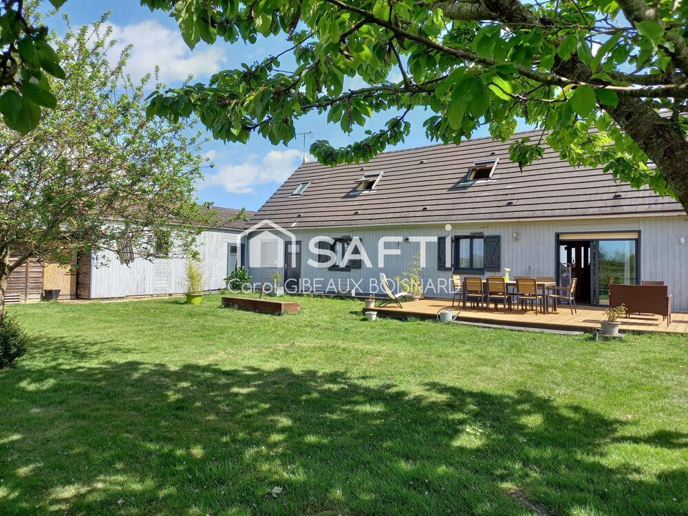 Beau pavillon avec 4 chambres, 2 garages et terrain