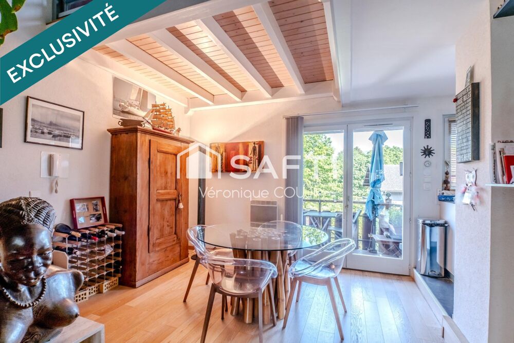 A Veigy-Foncenex (74140), duplex de charme aux beaux volumes avec piscine, à deux pas de la frontière.