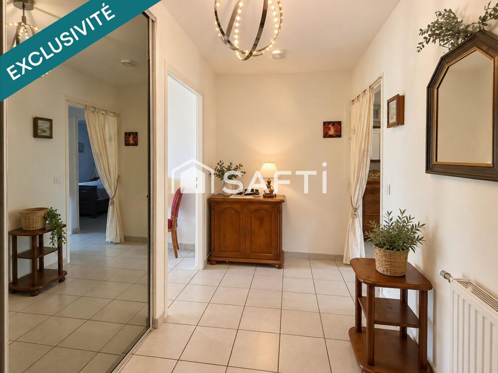APPARTEMENT T3 avec grande terrasse au coeur d'un environnement verdoyant.