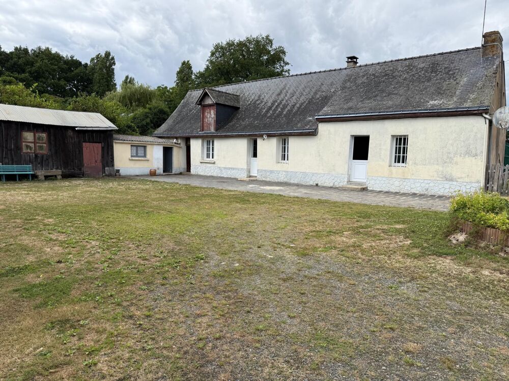 Cette grande fermette de plain pied avec terrain terrain agricole et plan d'eau.