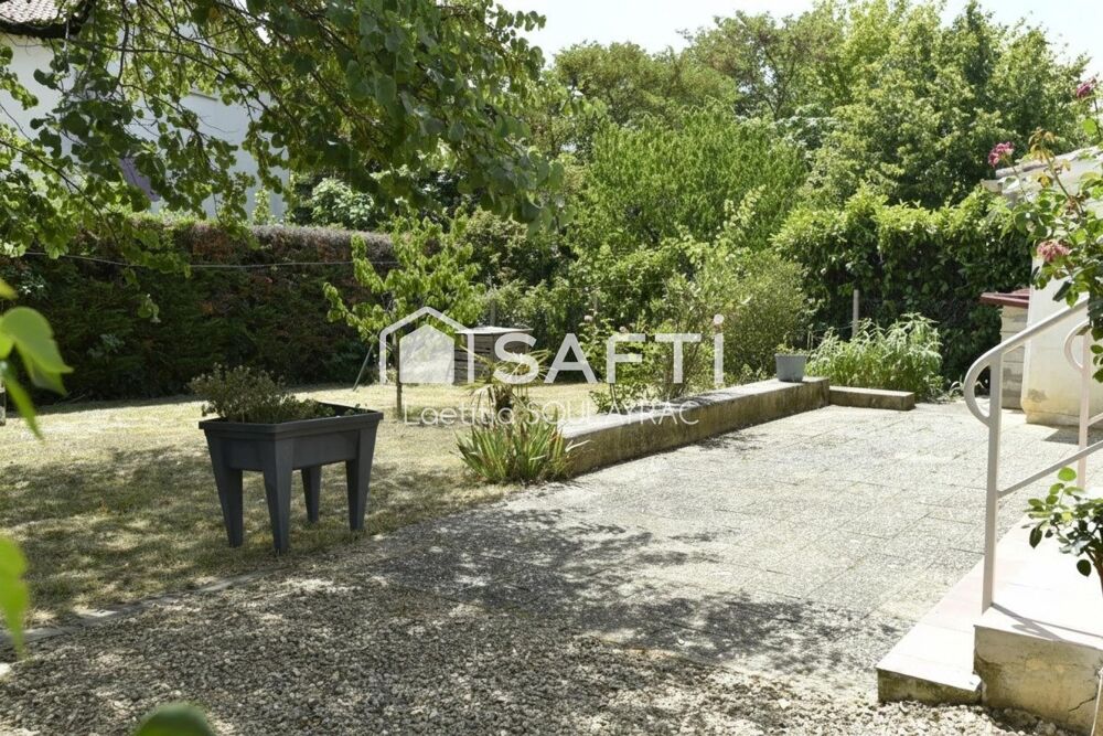 Maison 81 m² avec garage et jardin, proche centre.