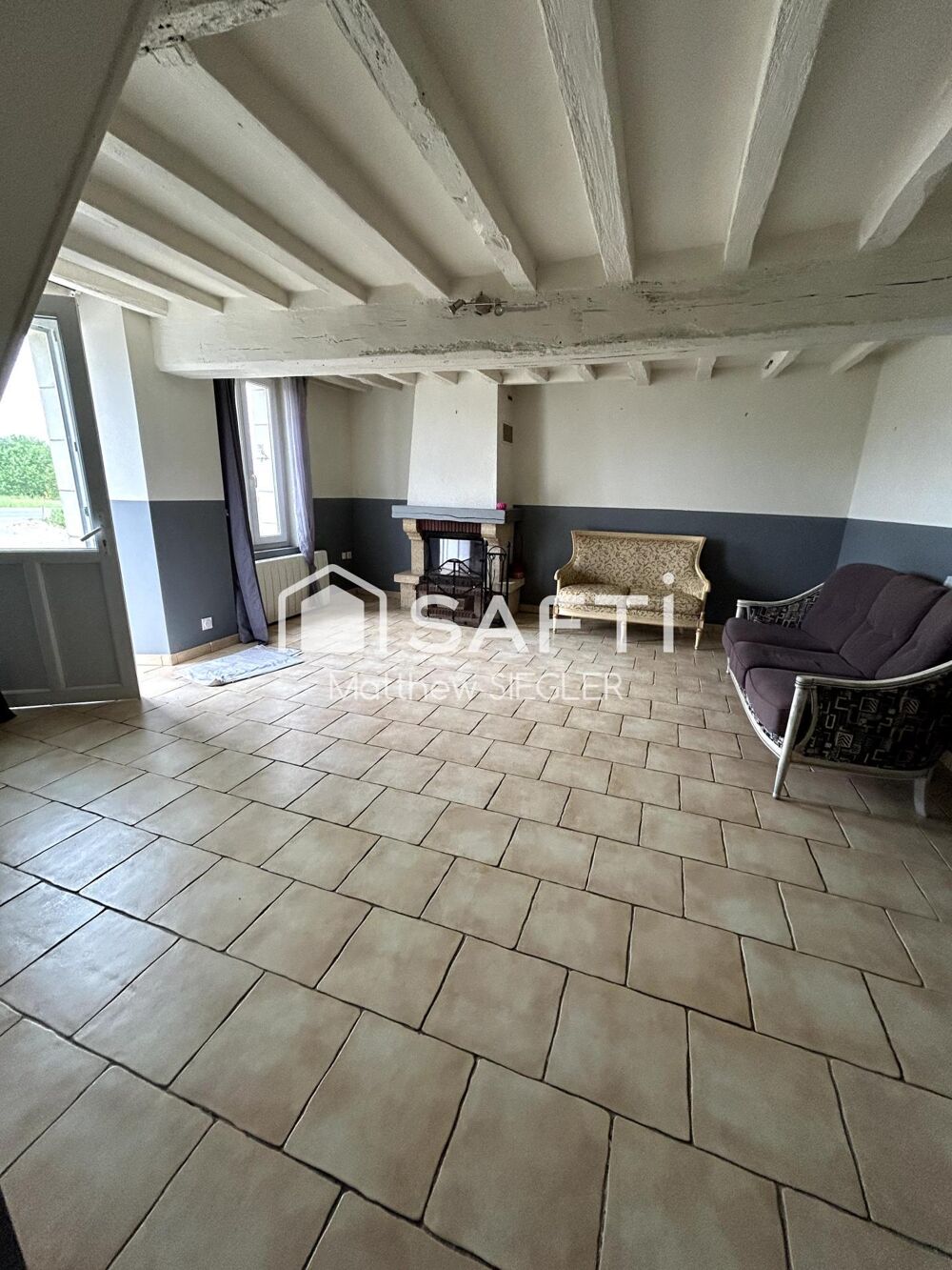 Vente Maison Maison en pierre pleine de charme avec beau jardin arboré, grande pièce de vie lumineuse et fort potentiel d'aménagement à Longu Longue-jumelles