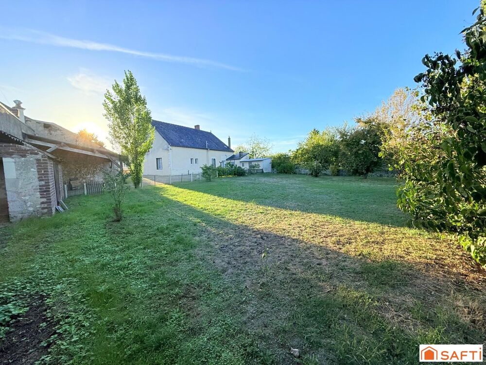 Maison de bourg avec 1290 m2 de Terrain