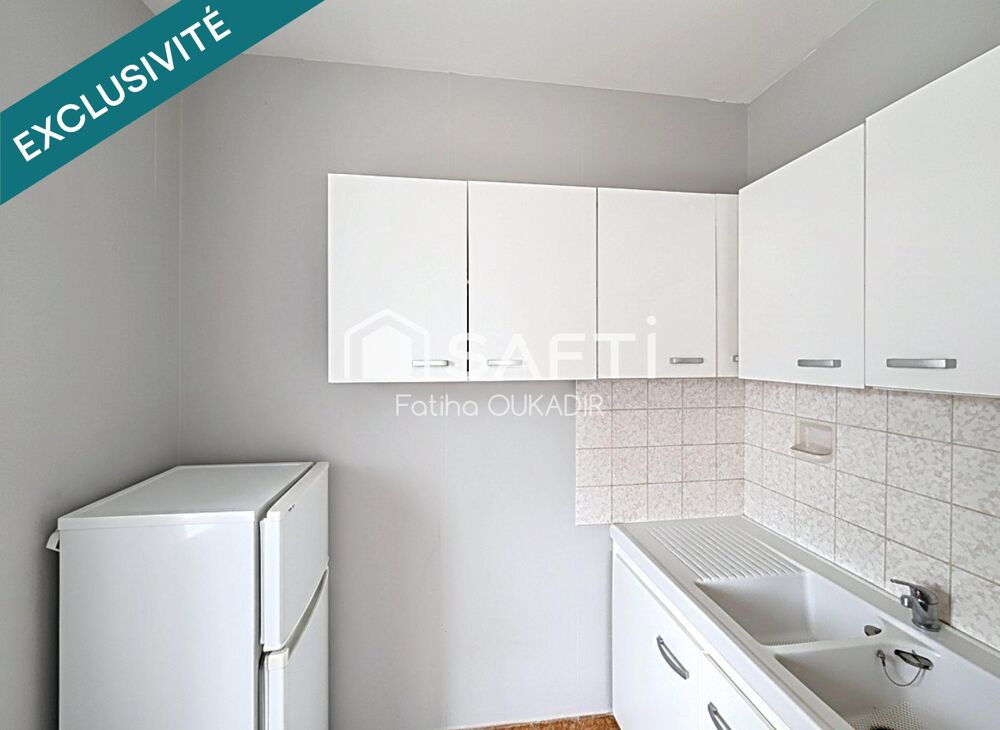 Appartement à DEUX MINUTES À PIED DE LA GARE avec balcon, cave et GARAGE.