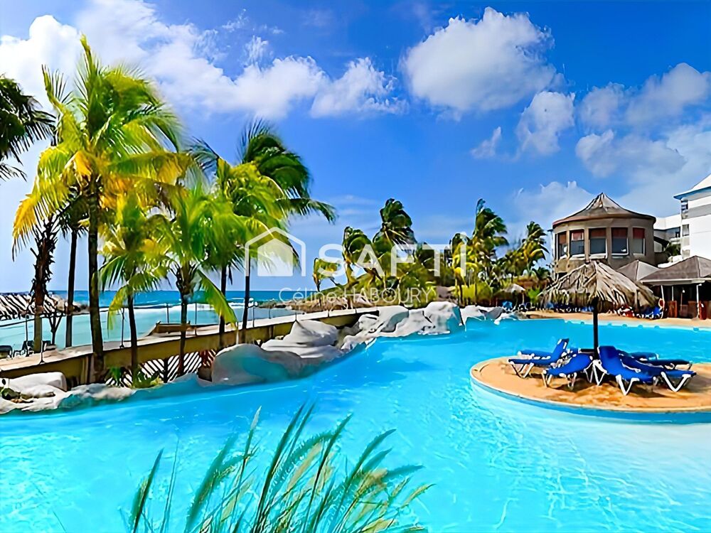 SUPERBE STUDIO EN REZ DE CHAUSSEE AVEC VUE SUR LA PISCINE ET VUE MER ROUTE TOURISTIQUE A SAINT FRANCOIS
