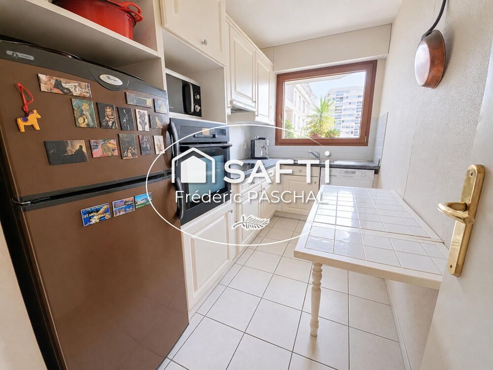 Appartement 55 m² - Balcon / Cave / Parking - République