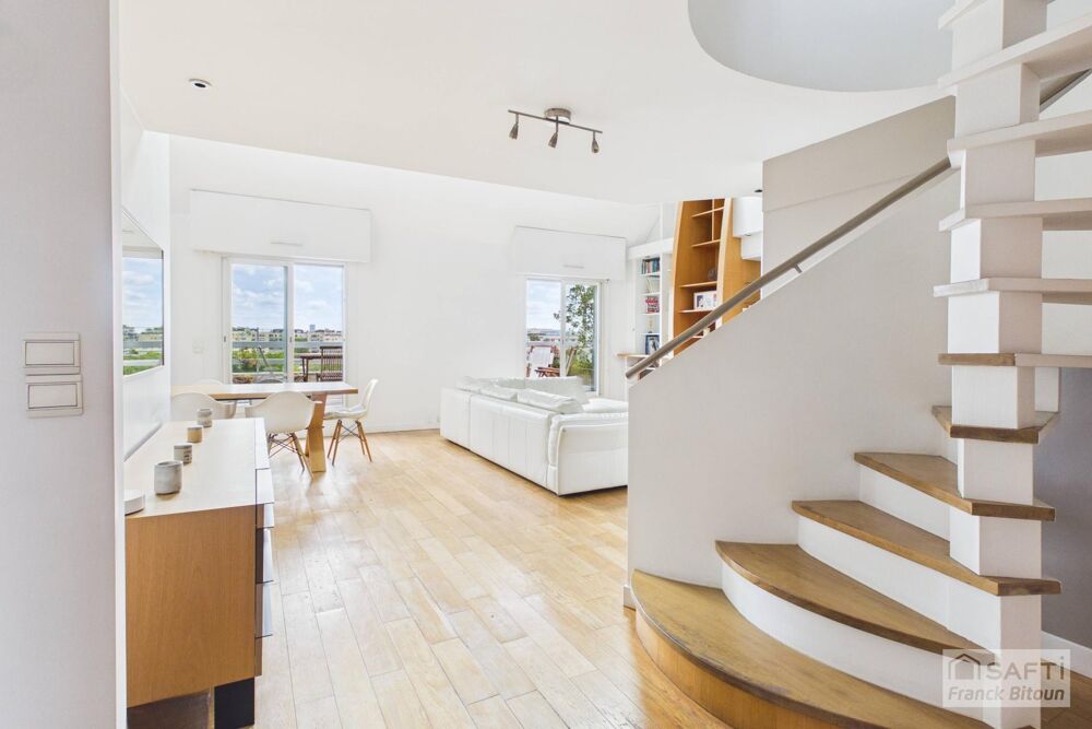 Vente Appartement Bécon, Pont de Levallois. Duplex en dernier étage avec terrasse vue Seine. Courbevoie
