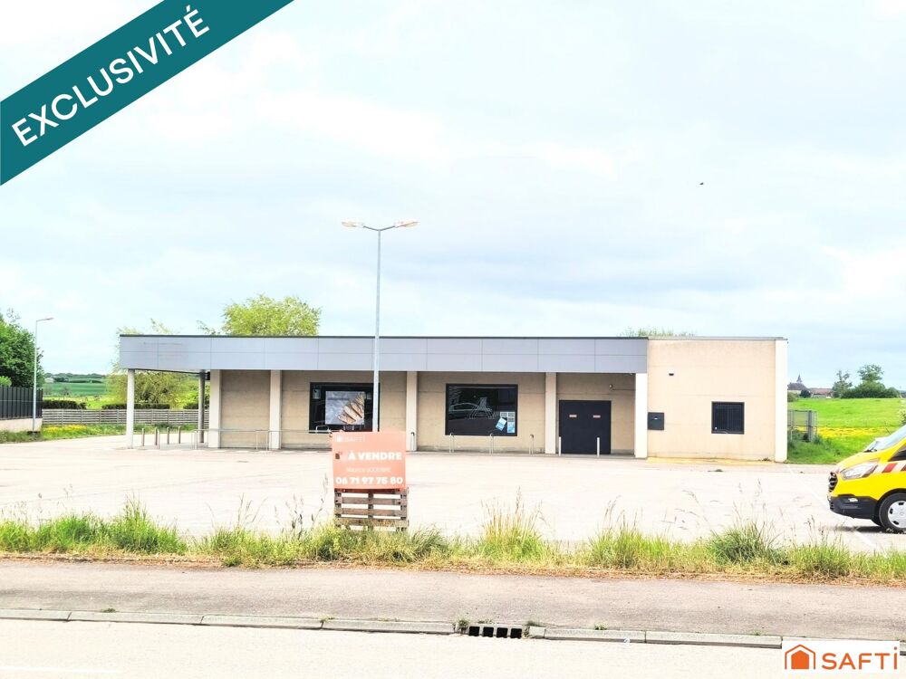   Vaste local commercial libre d'occupation, modulable pour diverses activités, dans un emplacement de choix 