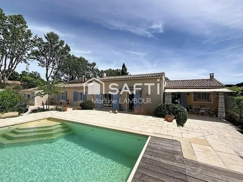 Maison provençale T5 de plain-pied avec terrasses jardin arboré et piscine.