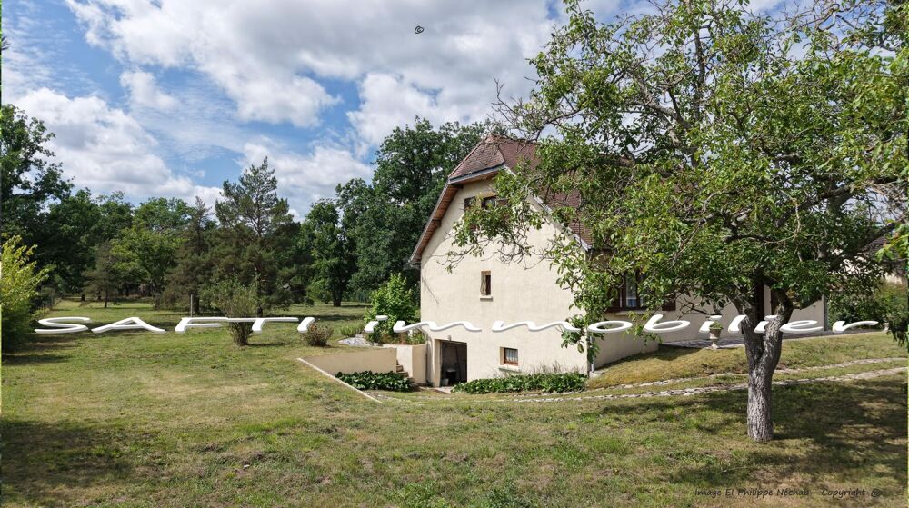 Maison de 177m2 habitables - 4 chambres - terrain de 6600m2 autour + sous-sol total .