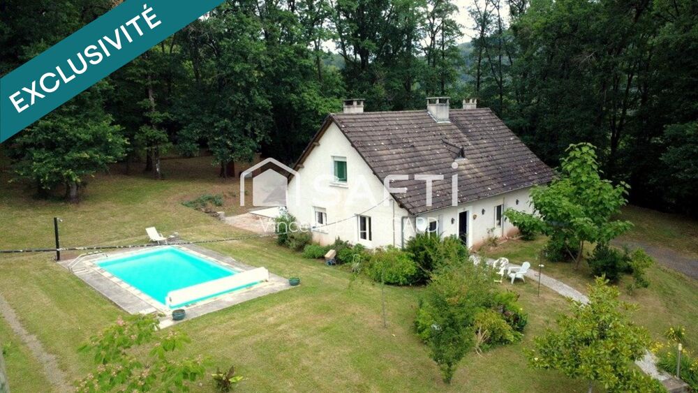 Maison 6 pièces avec cave garage atelier et piscine