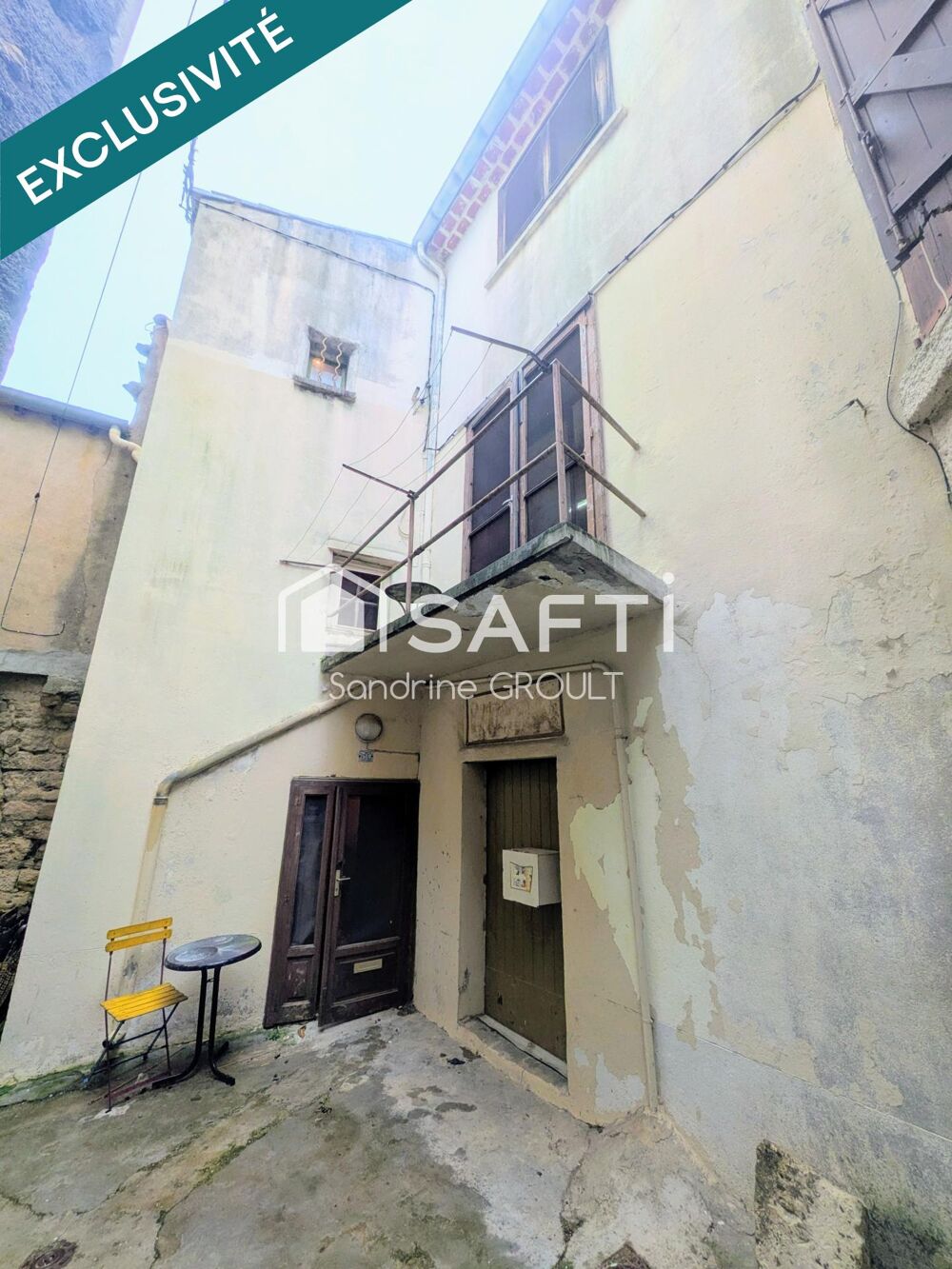 MAISON de VILLAGE avec CAVE et BALCON à RÉNOVER