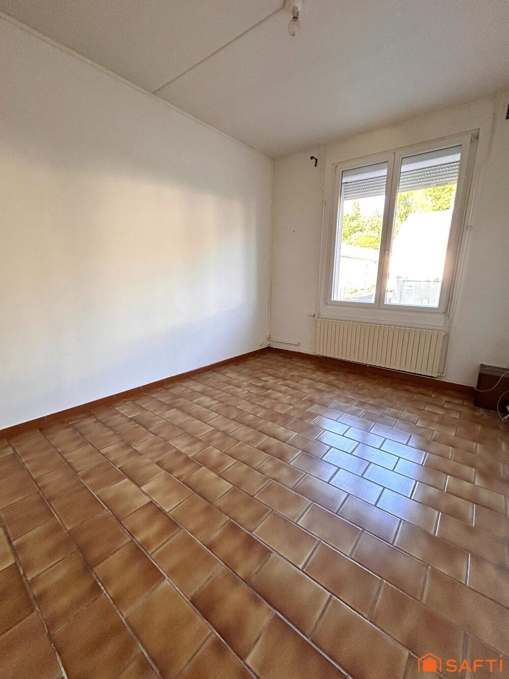 Maison de ville de 111m² - 3 chambres et bureau - cour