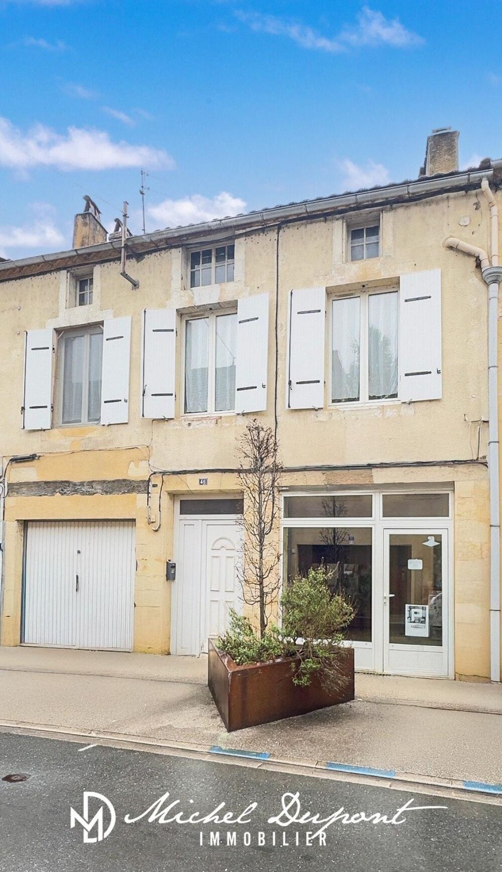Appartement de 83 m² avec surface commerciale vitrée