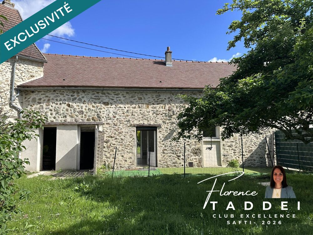 Fort potentiel pour cette maison de ville avec jardin, cave, et espace de stockage.