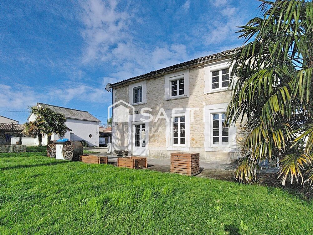 Maison en pierre avec piscine et garage