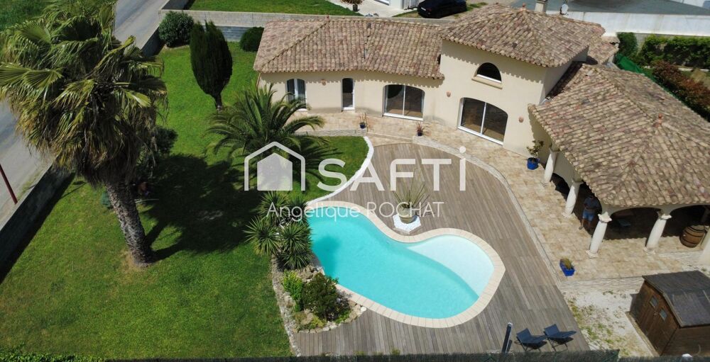 Vente Maison Nouveauté chez SAFTI Magnifique  Languedocienne T5 piscine Garage sur un jardin idéale de 1050m2 Magalas